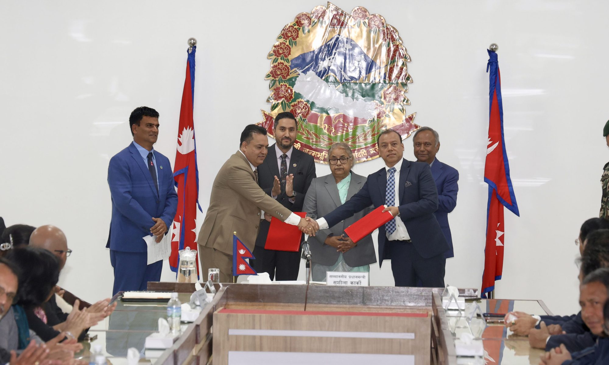 NRNA two factions agree to unite, Minister Kharel insists on sustainability of unification